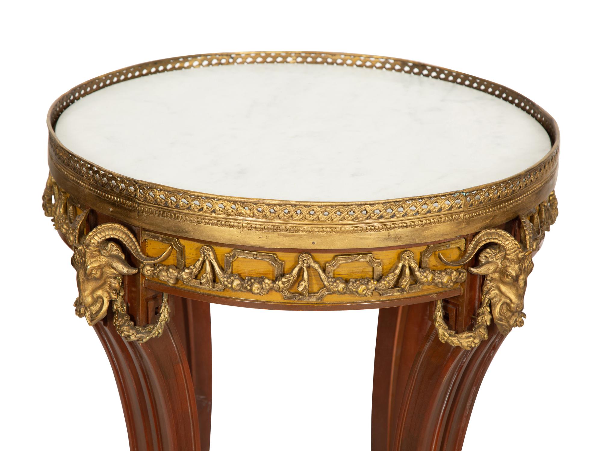 A Pair of Louis XVI Style Gilt Metal Mounted Walnut Gueridons