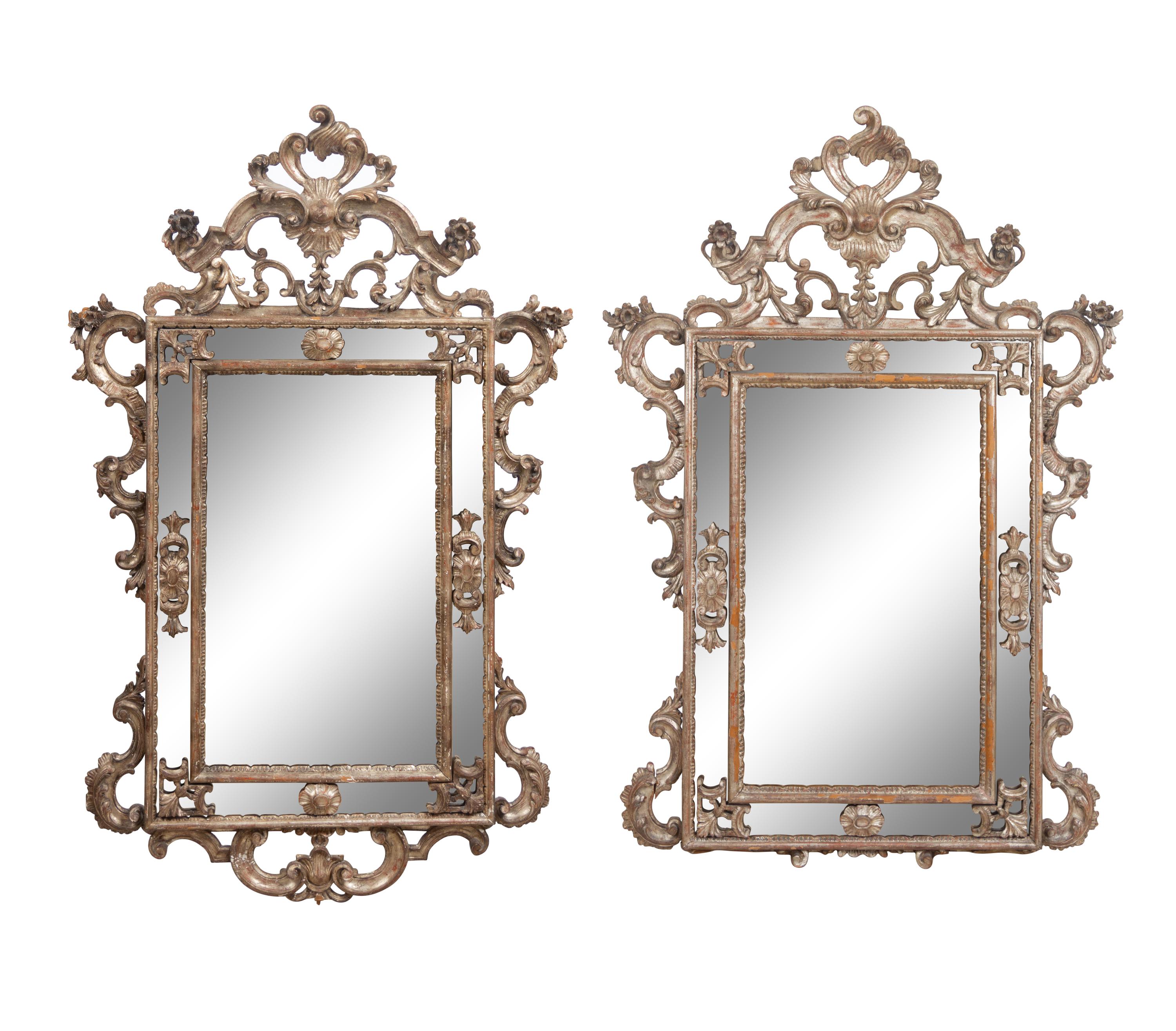 A Pair of Italian Baroque Style Silvered Mirrors