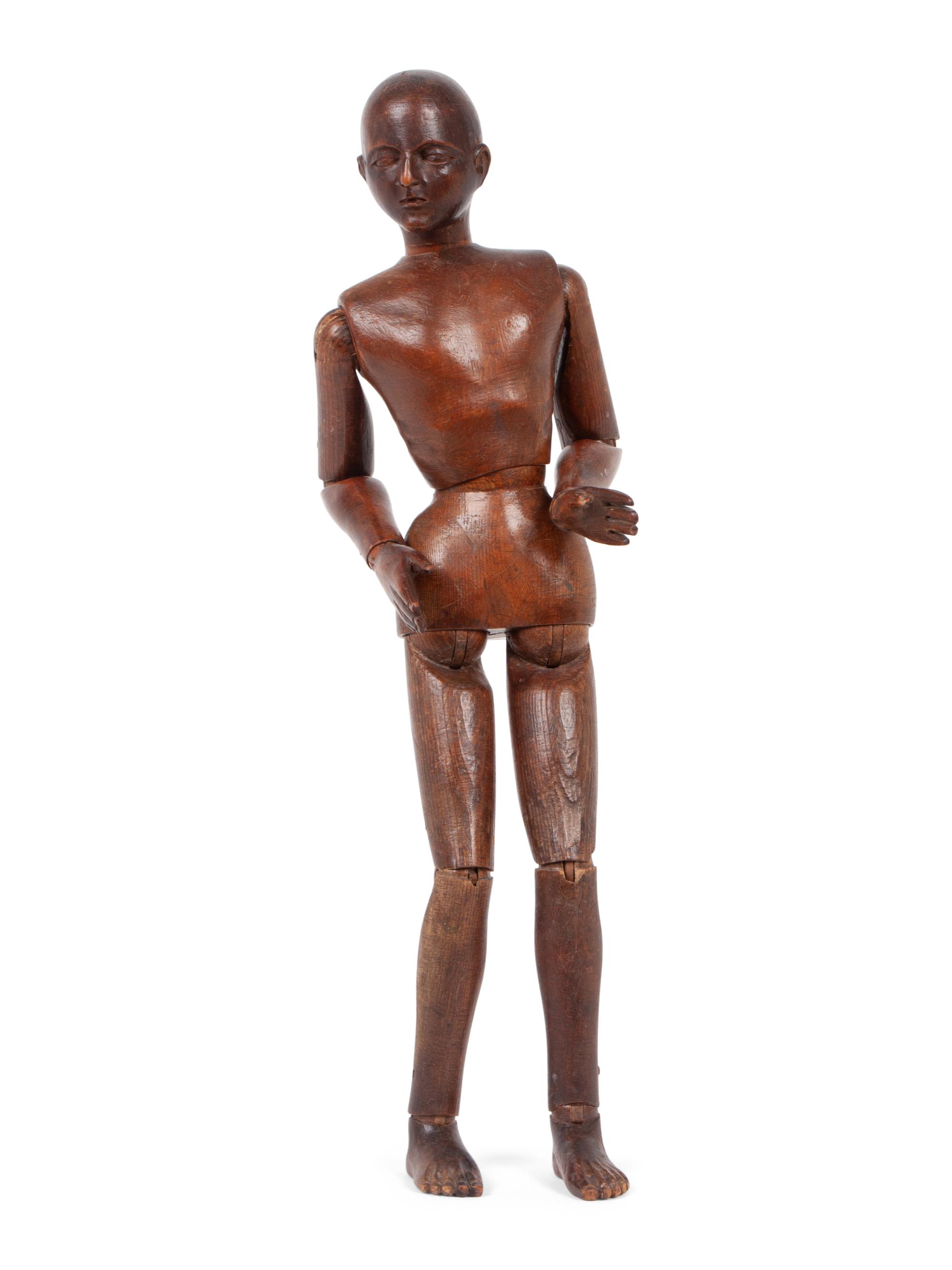An Articulated Carved Wood Artist's Model