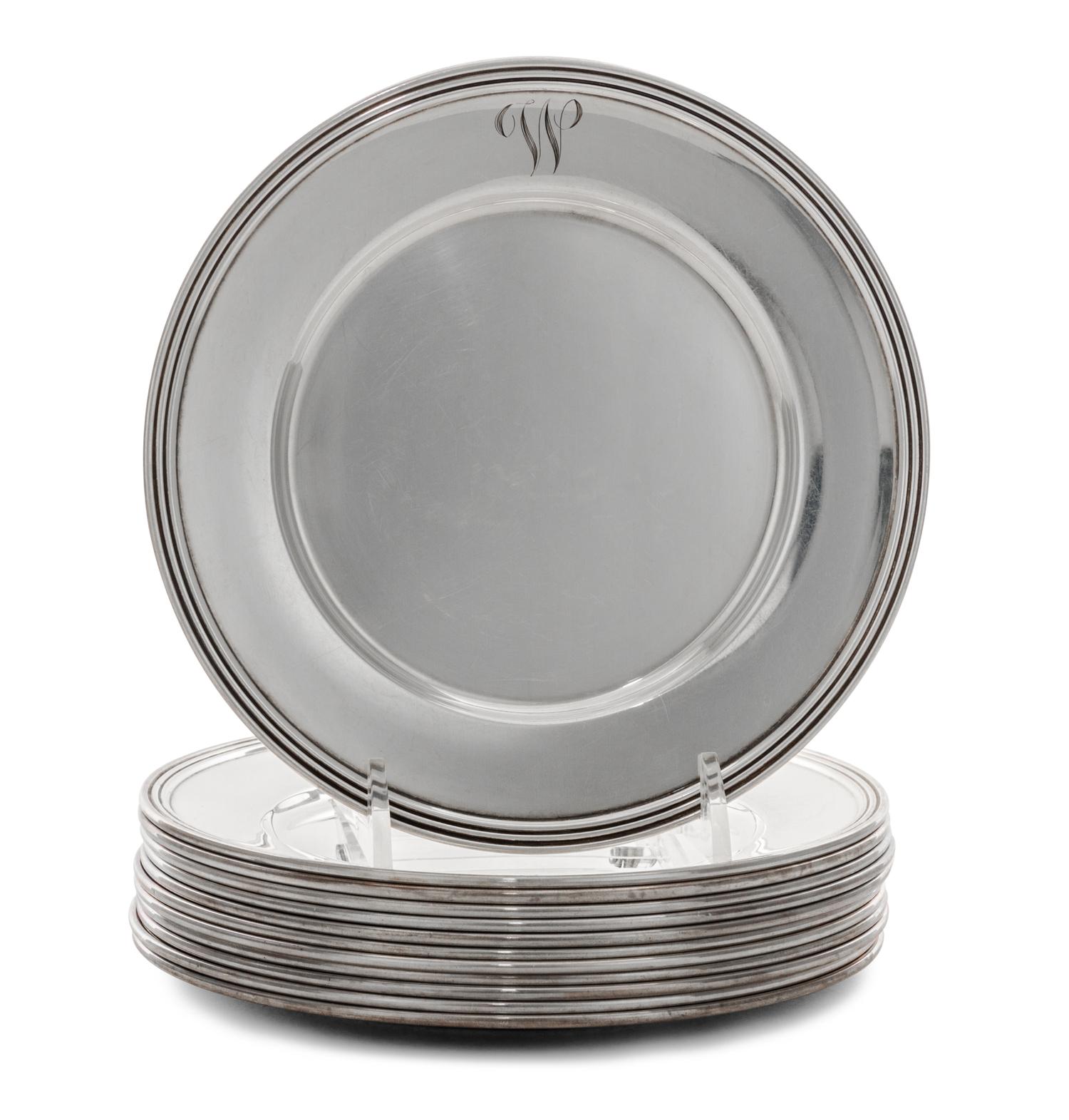 A Set of Twelve American Silver Bread Plates, Manchester Silver Co., Providence, RI, 20th Century, each with a reeded edge.