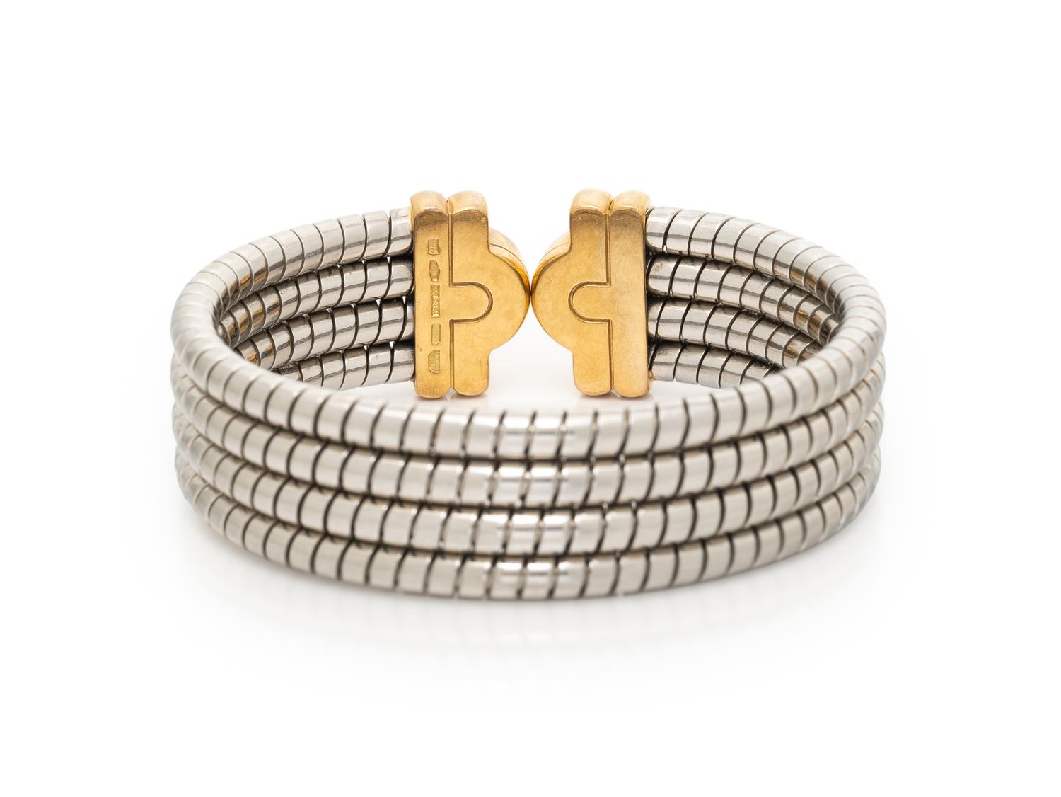 BULGARI, 'PARENTESI', STAINLESS STEEL AND YELLOW GOLD CUFF BRACELET
