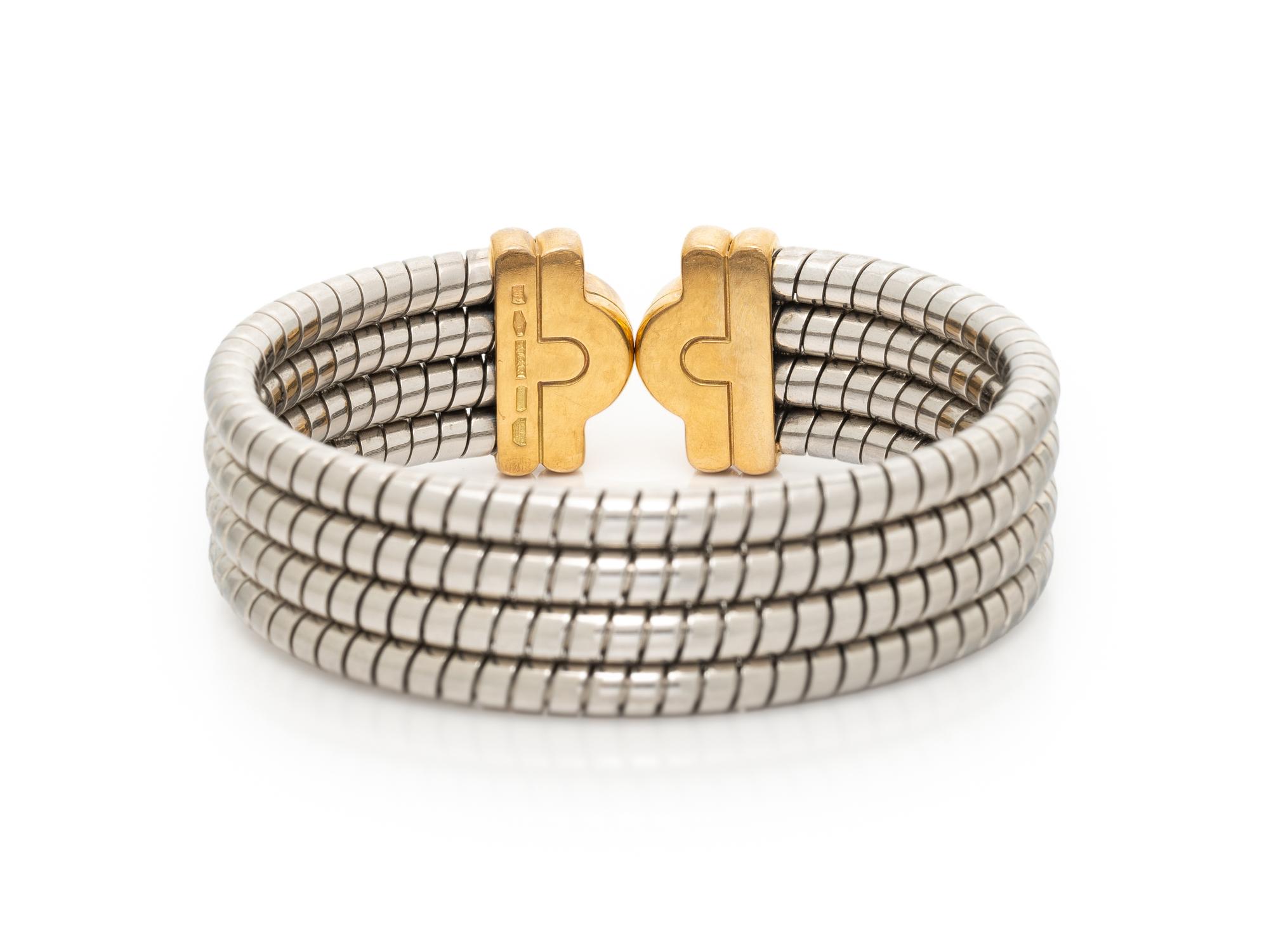 BULGARI, 'PARENTESI', STAINLESS STEEL AND YELLOW GOLD CUFF BRACELET