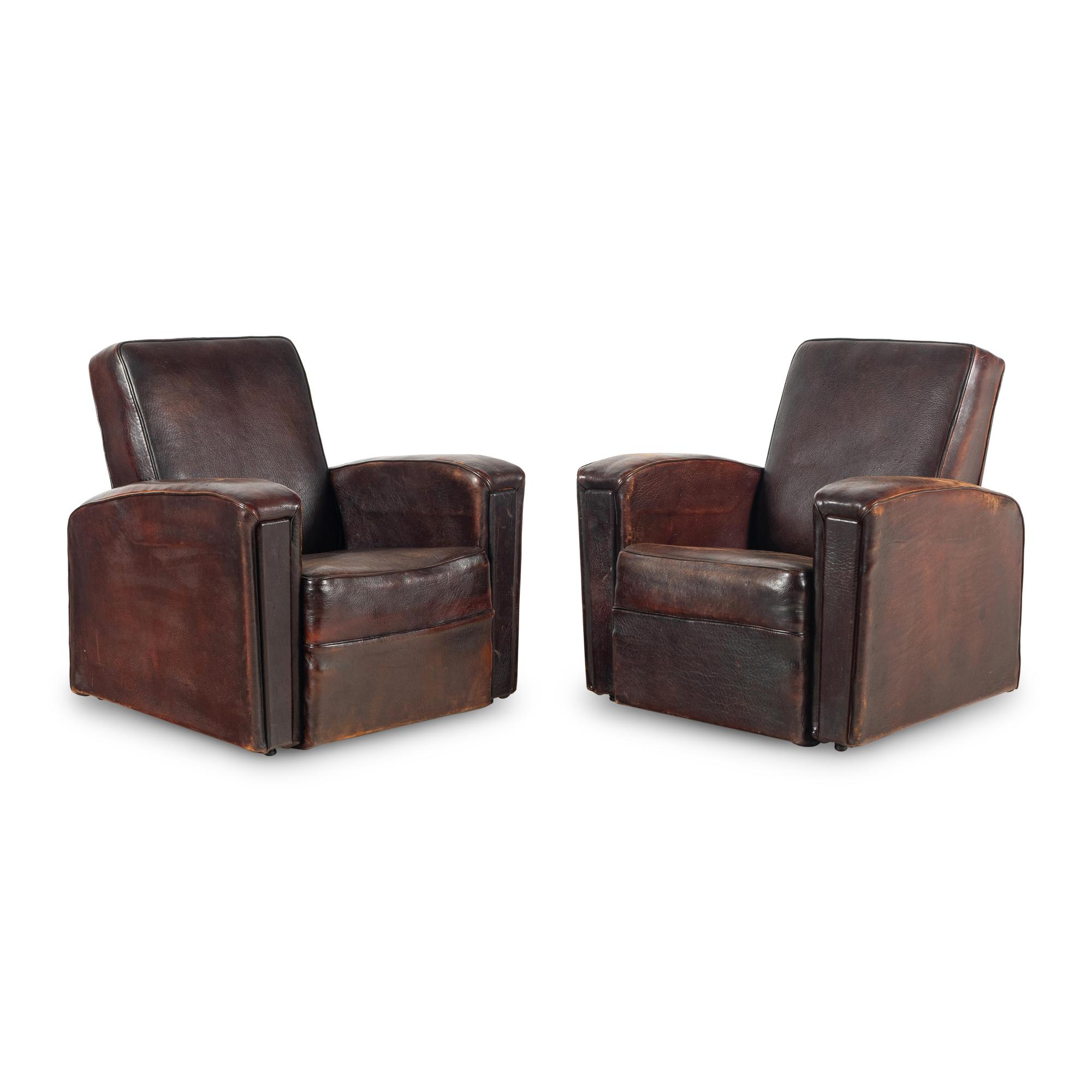 A Pair of Leather Club Chairs