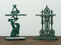 Two Green Painted Cast-Iron Umbrella Stands