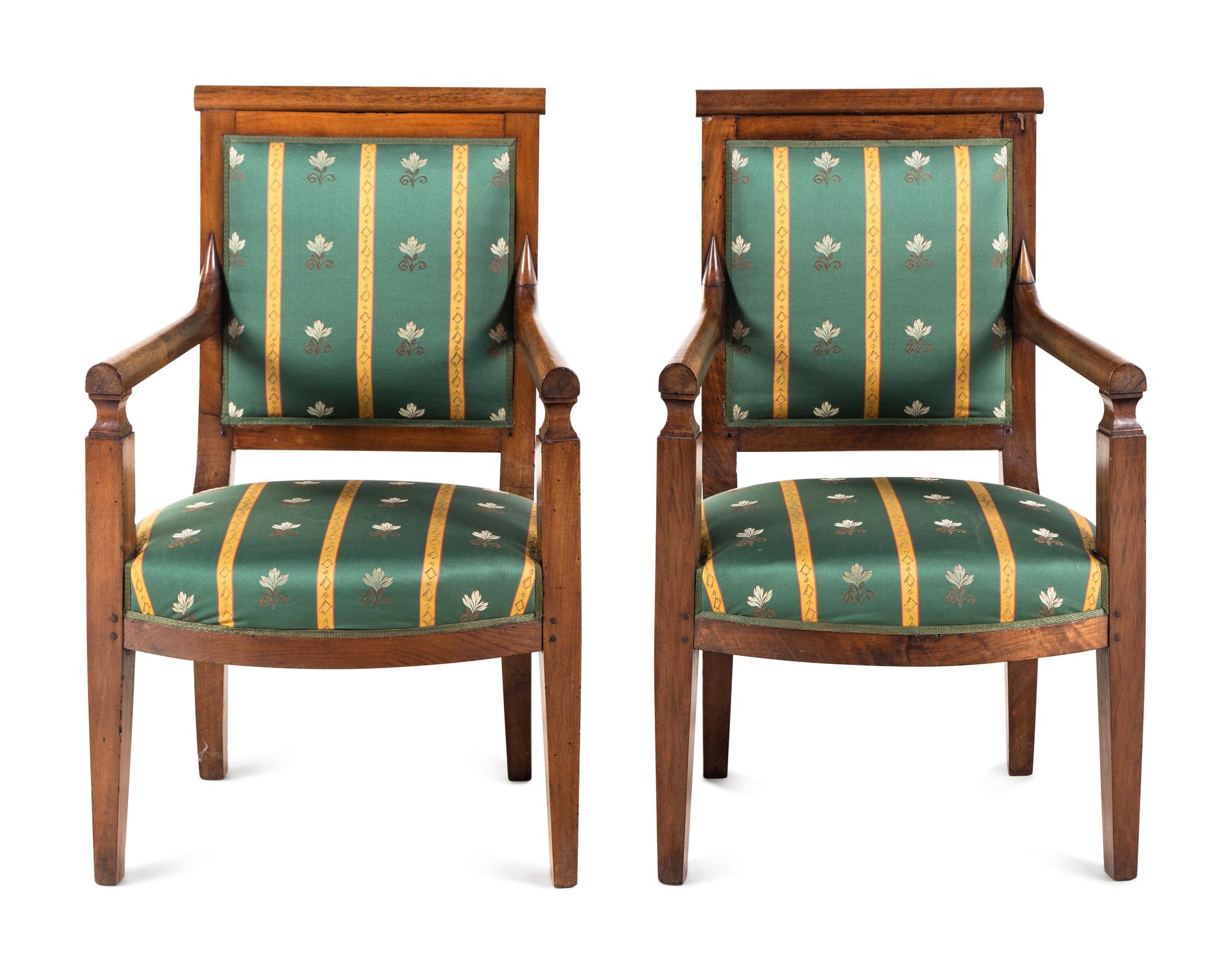 A Pair of Empire Walnut Fauteuils