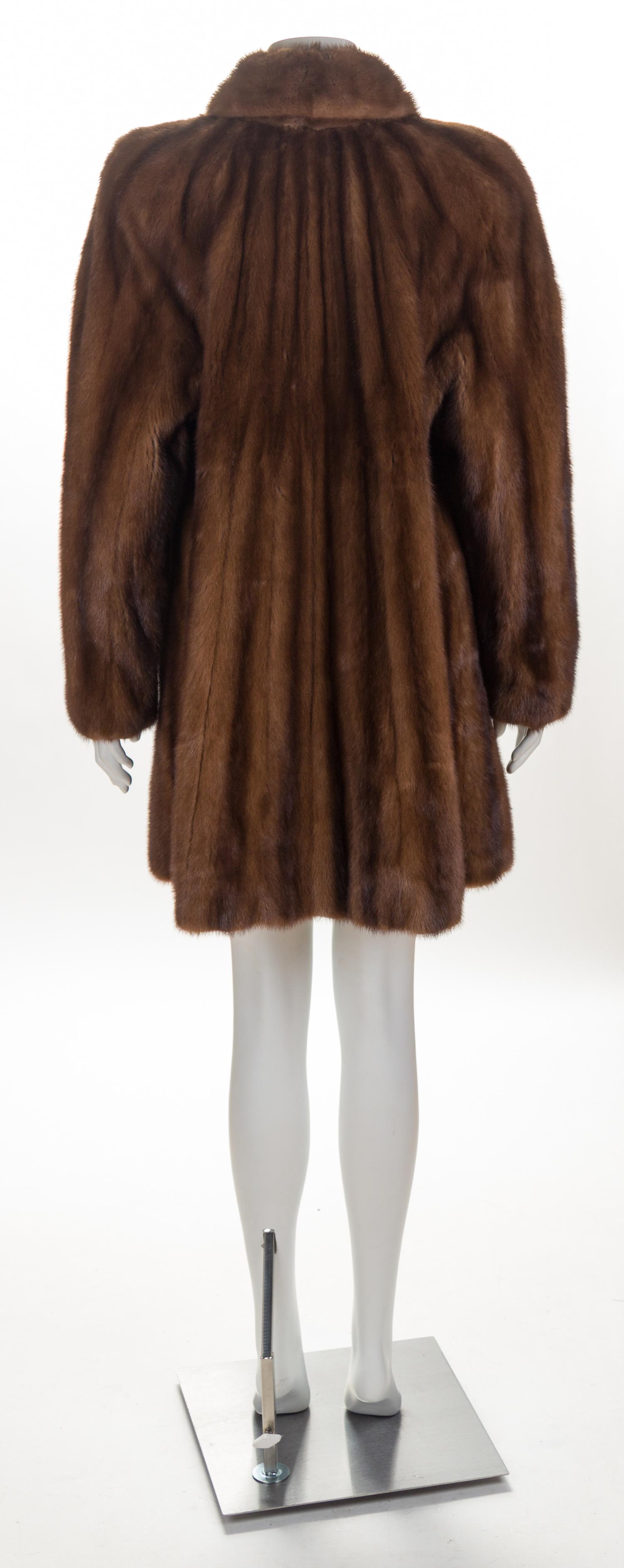 A Geoffrey Beene Brown Mink Knee-Length Coat, No size.