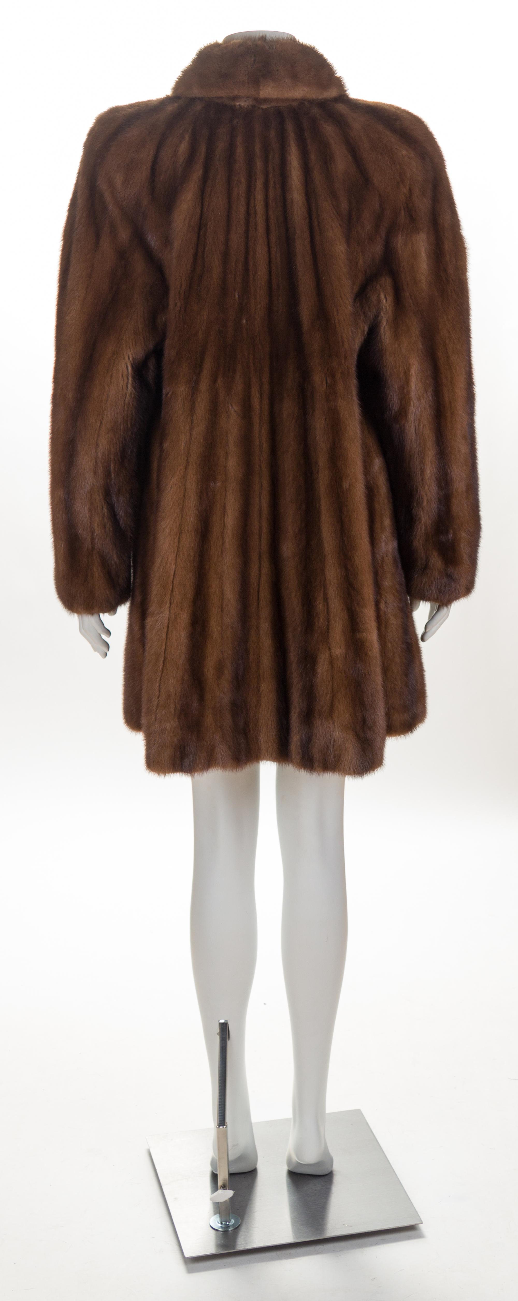 A Geoffrey Beene Brown Mink Knee-Length Coat, No size.