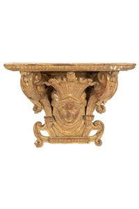 A Pair of Tin-Glazed Earthenware Wall Brackets, and Two Giltwood Wall Brackets