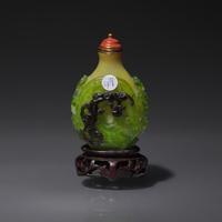 A Chinese Double-Overlay Glass Snuff Bottle, Qing Dynasty, Late 18th/Early 19th Century — 清中期 淡黃地套綠黑料螭龍紋鼻煙壺