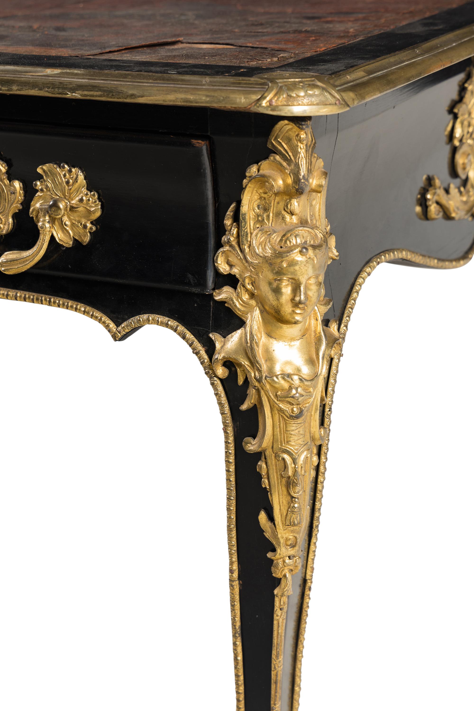 A Louis XV Style Gilt Bronze Mounted Ebonized Bureau Plat