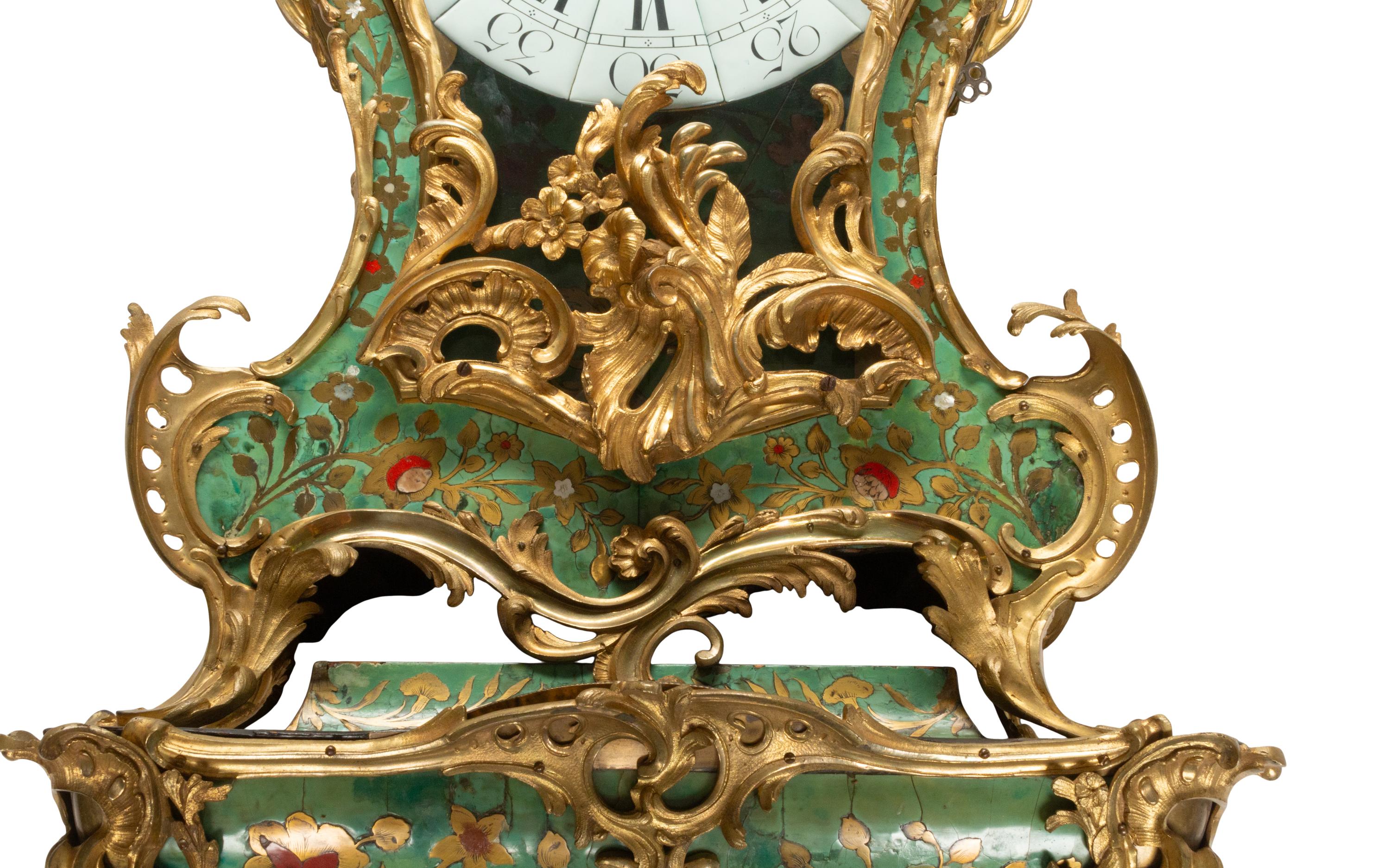 A Louis XV Green-Stained Horn and Gilt Bronze Mounted Cartel Clock and Bracket