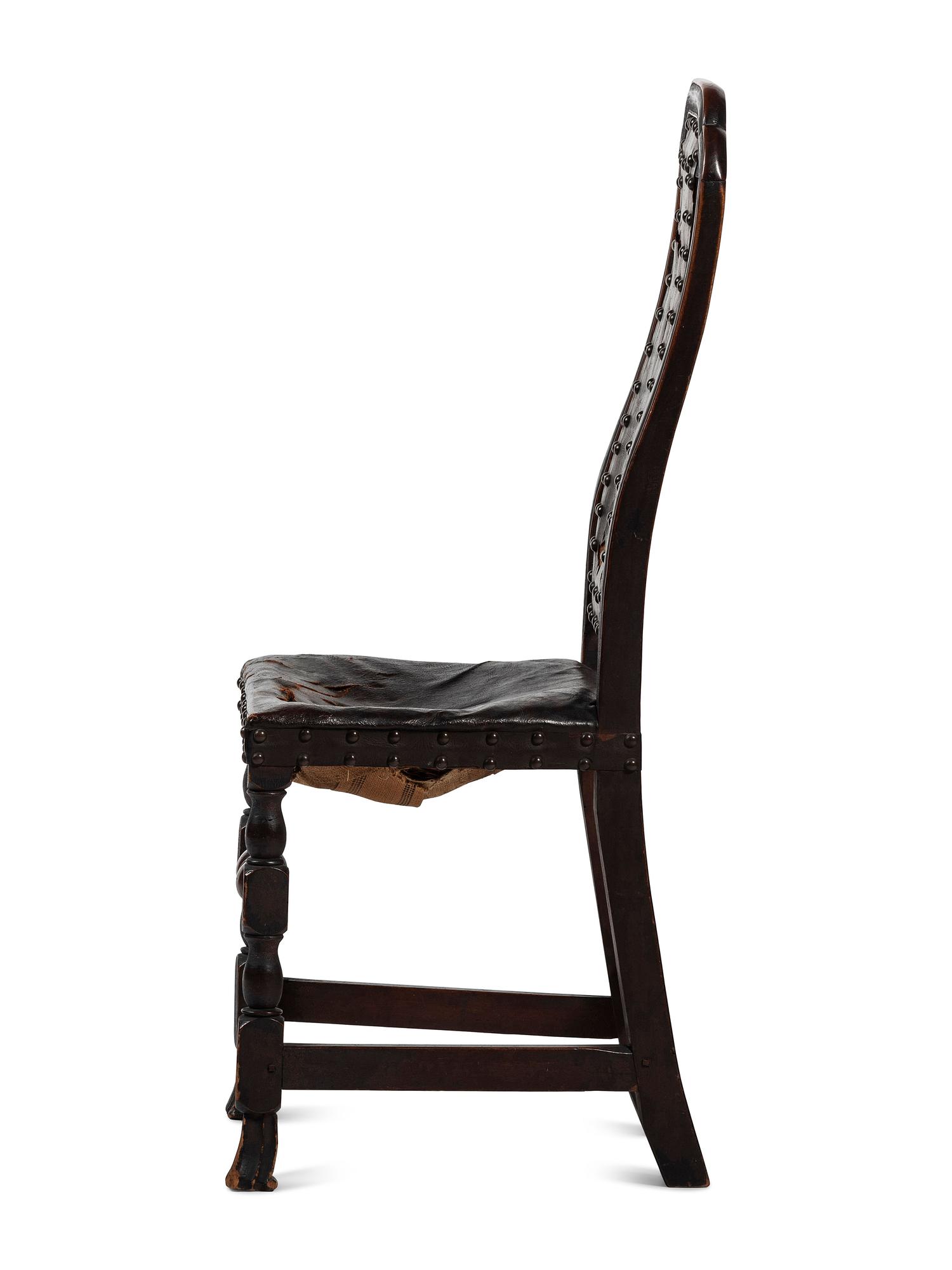 A William and Mary Leather Upholstered Spanish-Foot Side Chair
