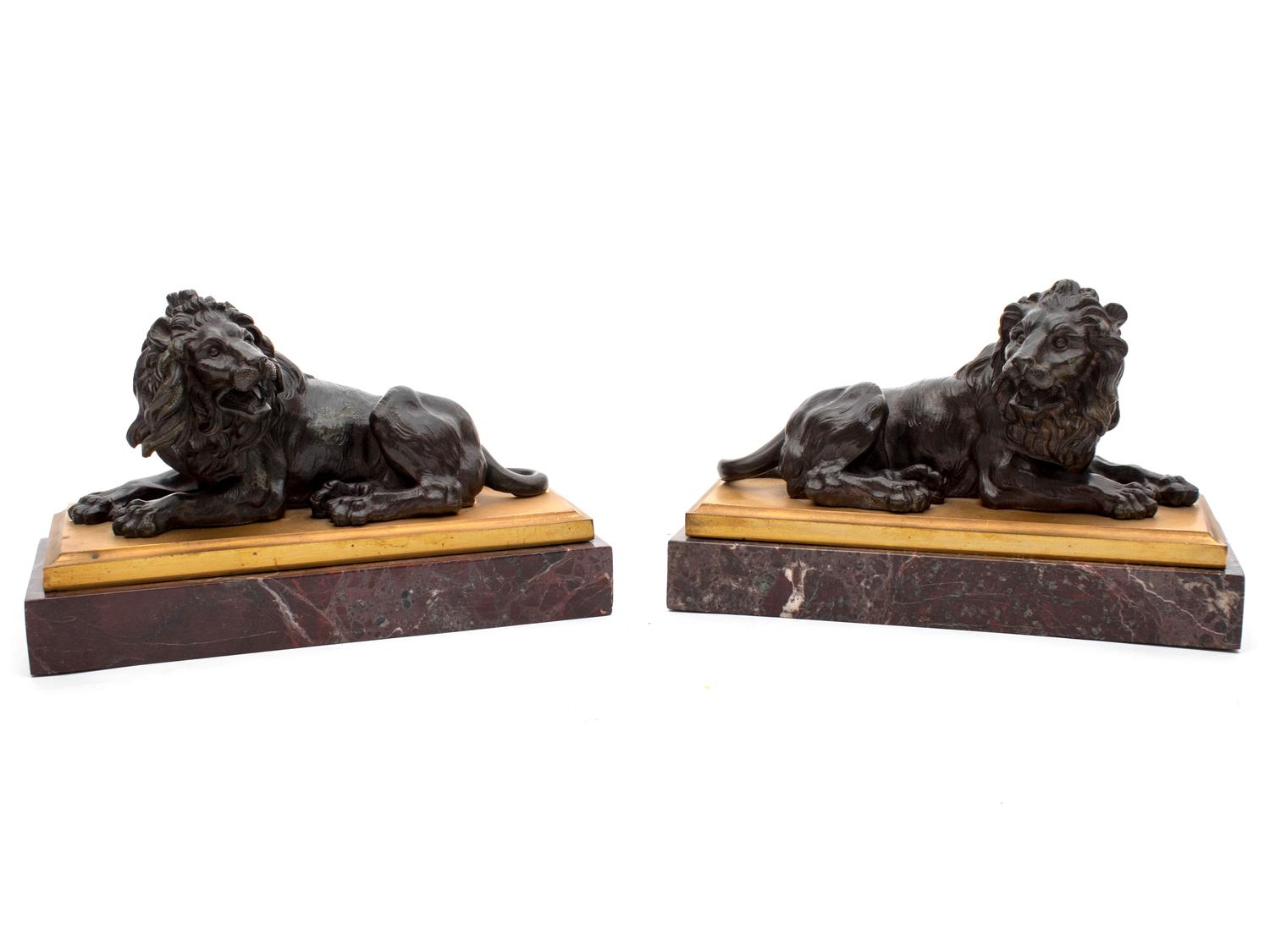 A Pair of Grand Tour Bronze Recumbent Lions — 19TH CENTURY