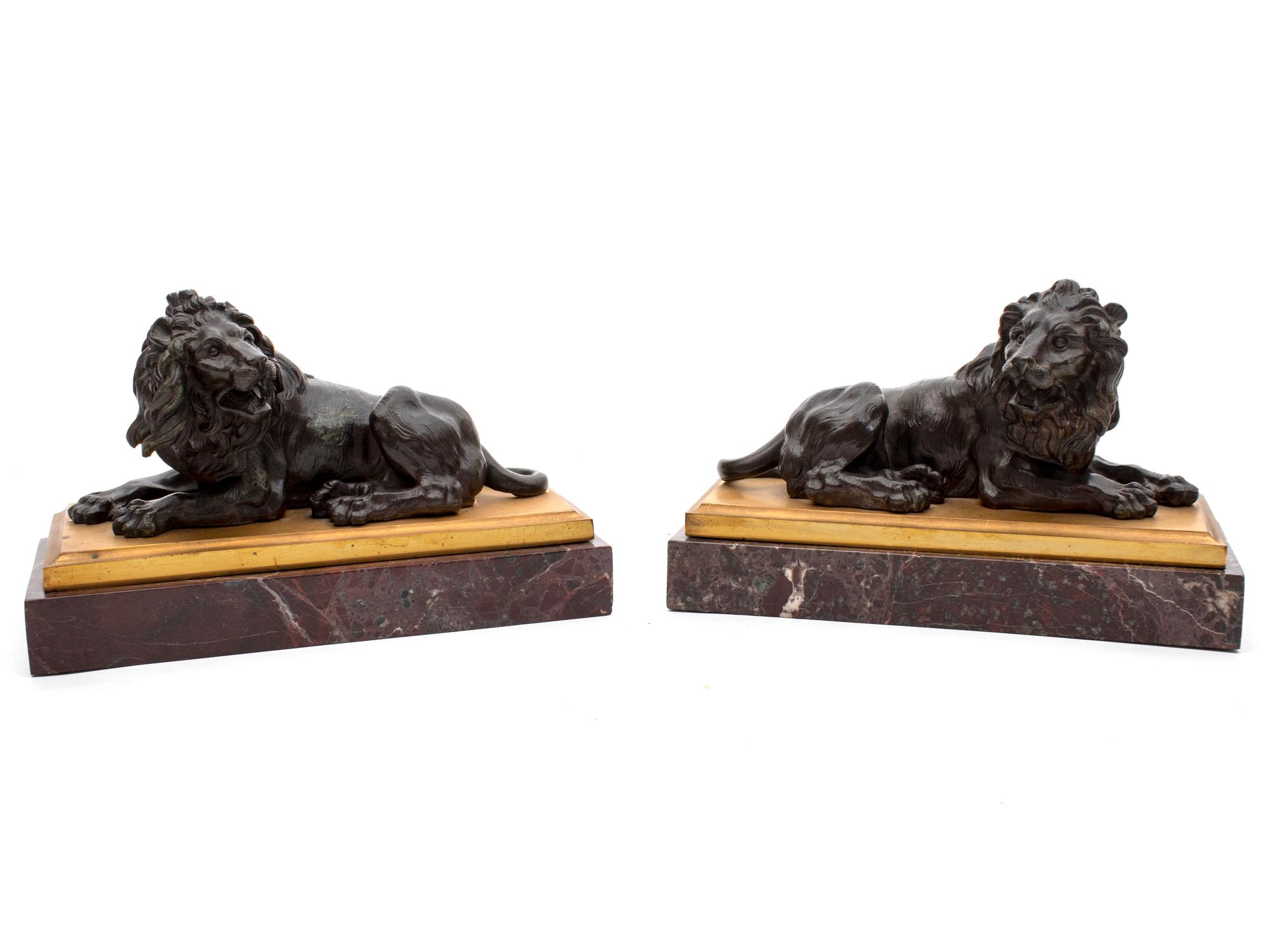 A Pair of Grand Tour Bronze Recumbent Lions — 19TH CENTURY