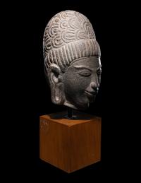 A Khmer Stone Head of Deity