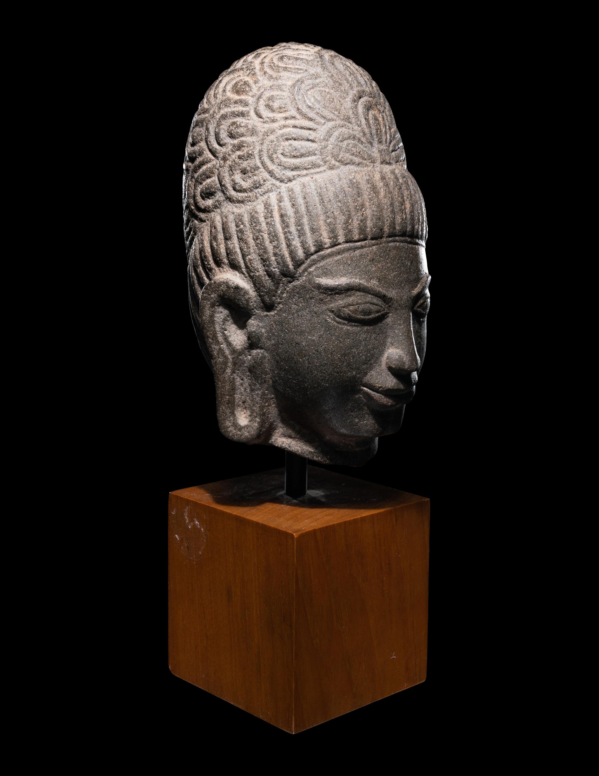 A Khmer Stone Head of Deity