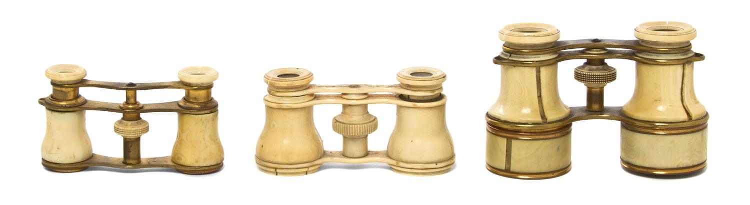 Three Pairs of Ivory and Ivory Veneered Opera Glasses, Width of widest 4 1/8 inches.