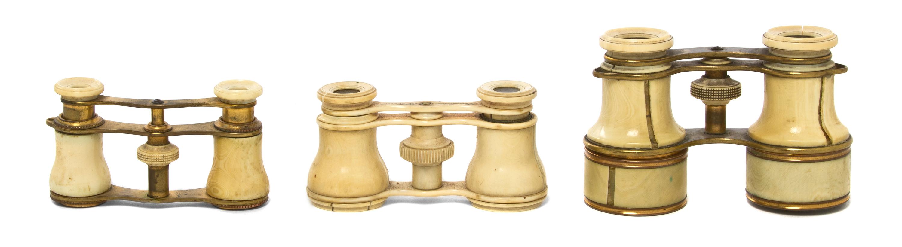 Three Pairs of Ivory and Ivory Veneered Opera Glasses, Width of widest 4 1/8 inches.