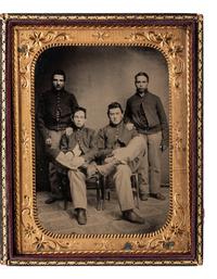 [CIVIL WAR]. Half plate ruby ambrotype of four cavalrymen or artillerymen.