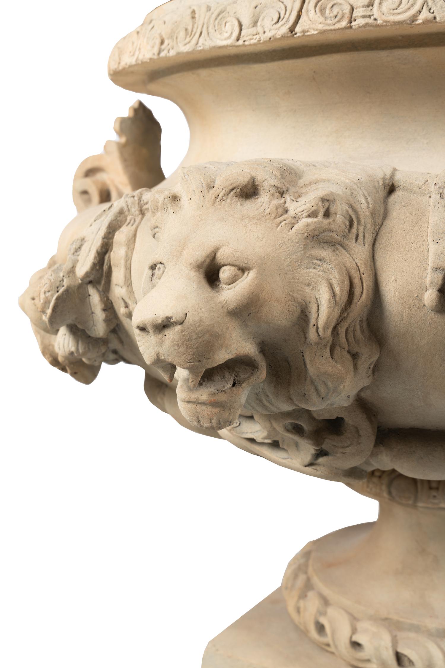 A Pair of Massive Neoclassical Style Terracotta Urns with Plinths