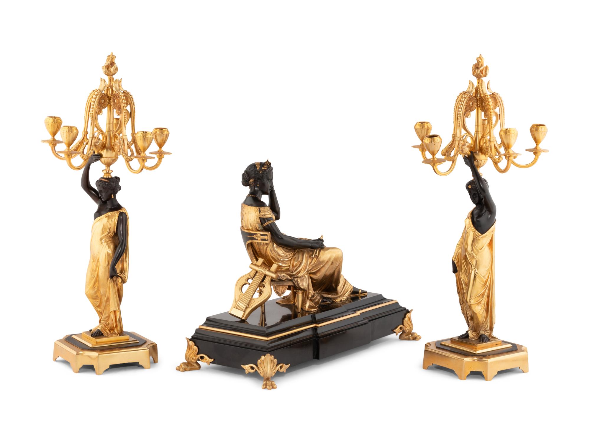 A Gilt and Patinated Bronze Figural Garniture after Jean Jules Salmson