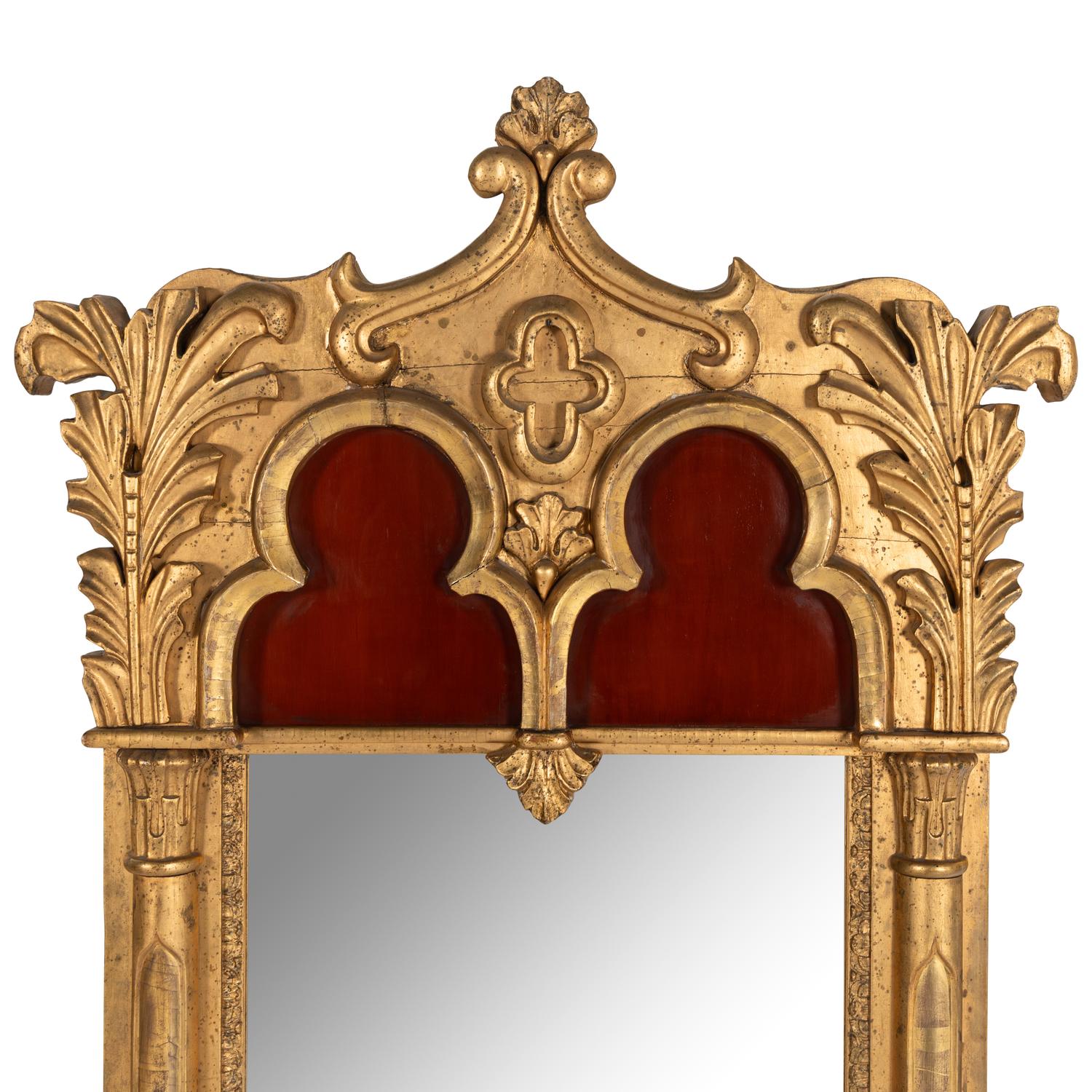 A Gothic Revival Giltwood and Gesso Pier Glass.