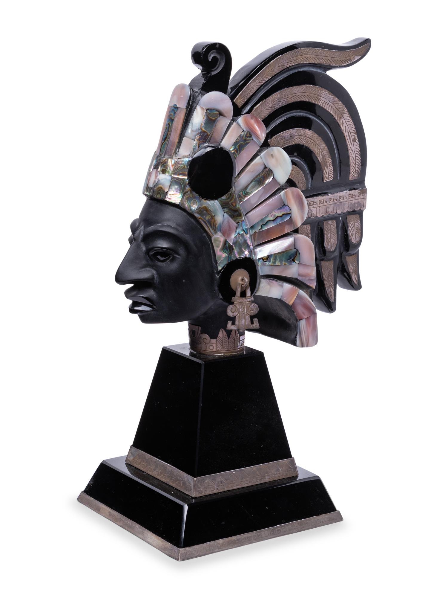 An Onyx and Mother-of-Pearl Bust of an Aztec Deity