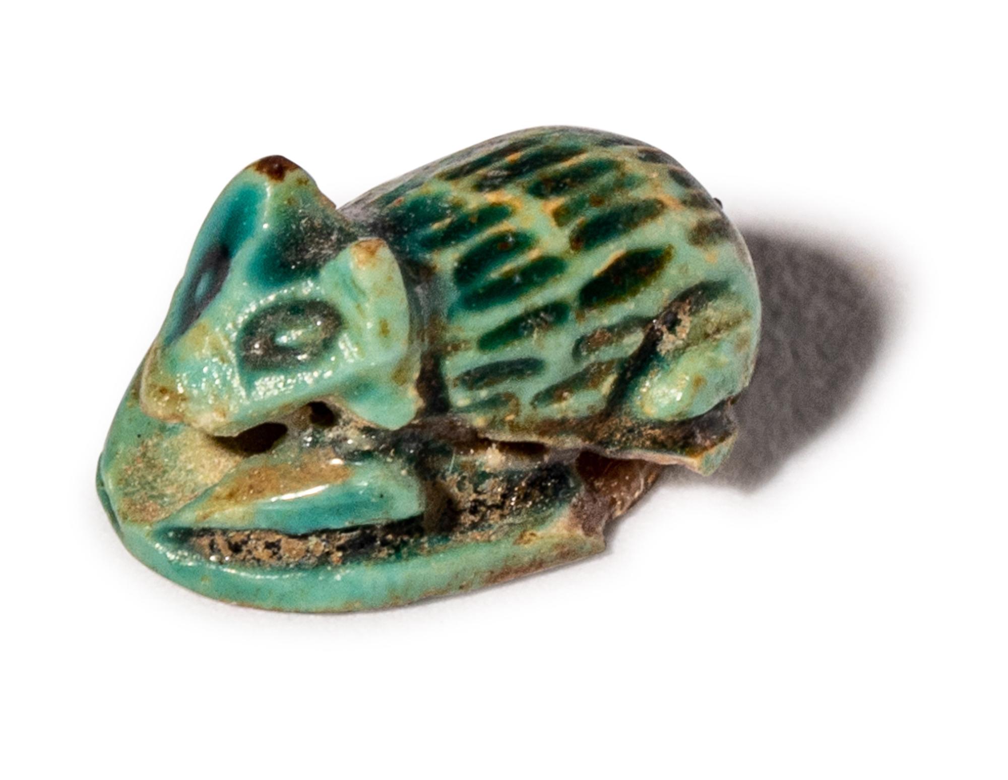 Four Egyptian Faience and Jasper Hedgehog Scaraboids