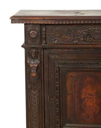 An Italian Carved Walnut Side Cabinet with Marquetry Panel Door