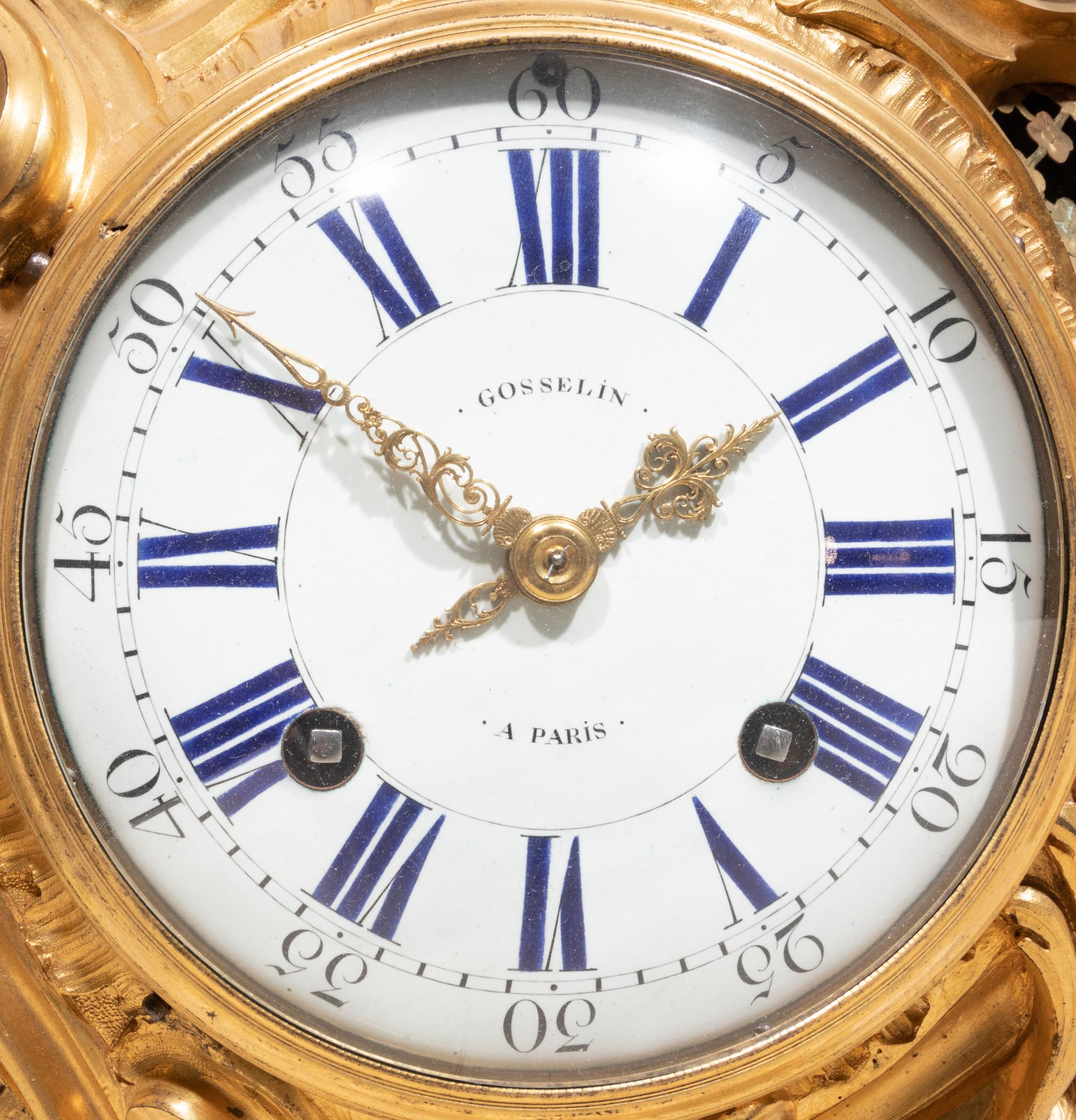 A Louis XV Gilt Bronze Cartel Clock
