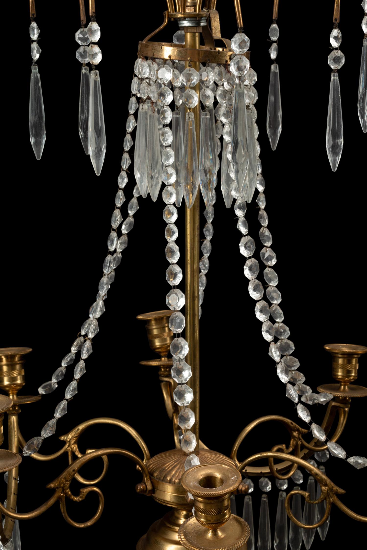 A Near Pair of Baltic Style Gilt Bronze, Marble and Cut Glass Six-Light Candelabra