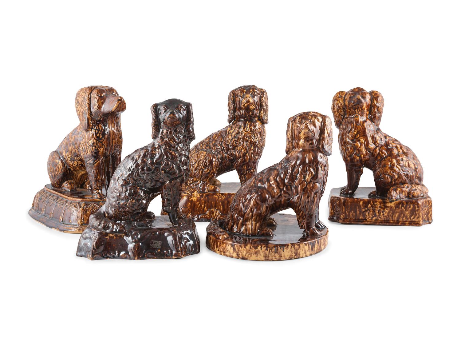Five Rockingham Glaze Spaniel Figures