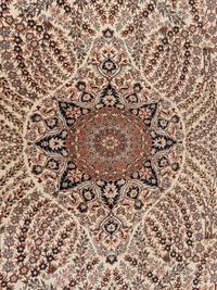 A Qom Wool Rug
