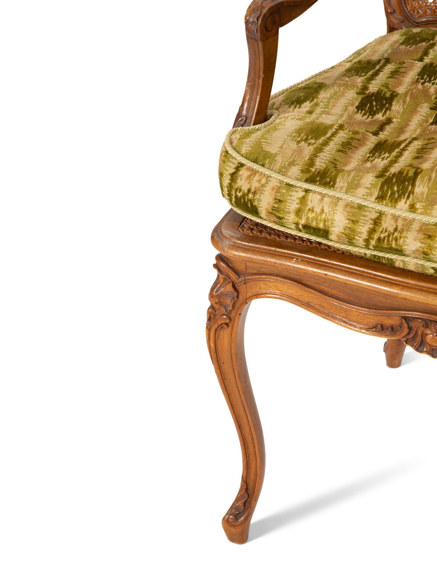 A Pair of Louis XV Style Caned Beechwood Fauteuils