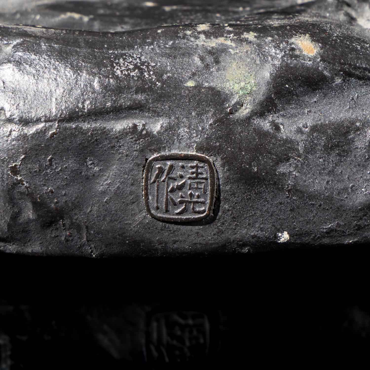 A Japanese Bronze Figure of a Fisherman by Seiko, Meiji/Taisho Period