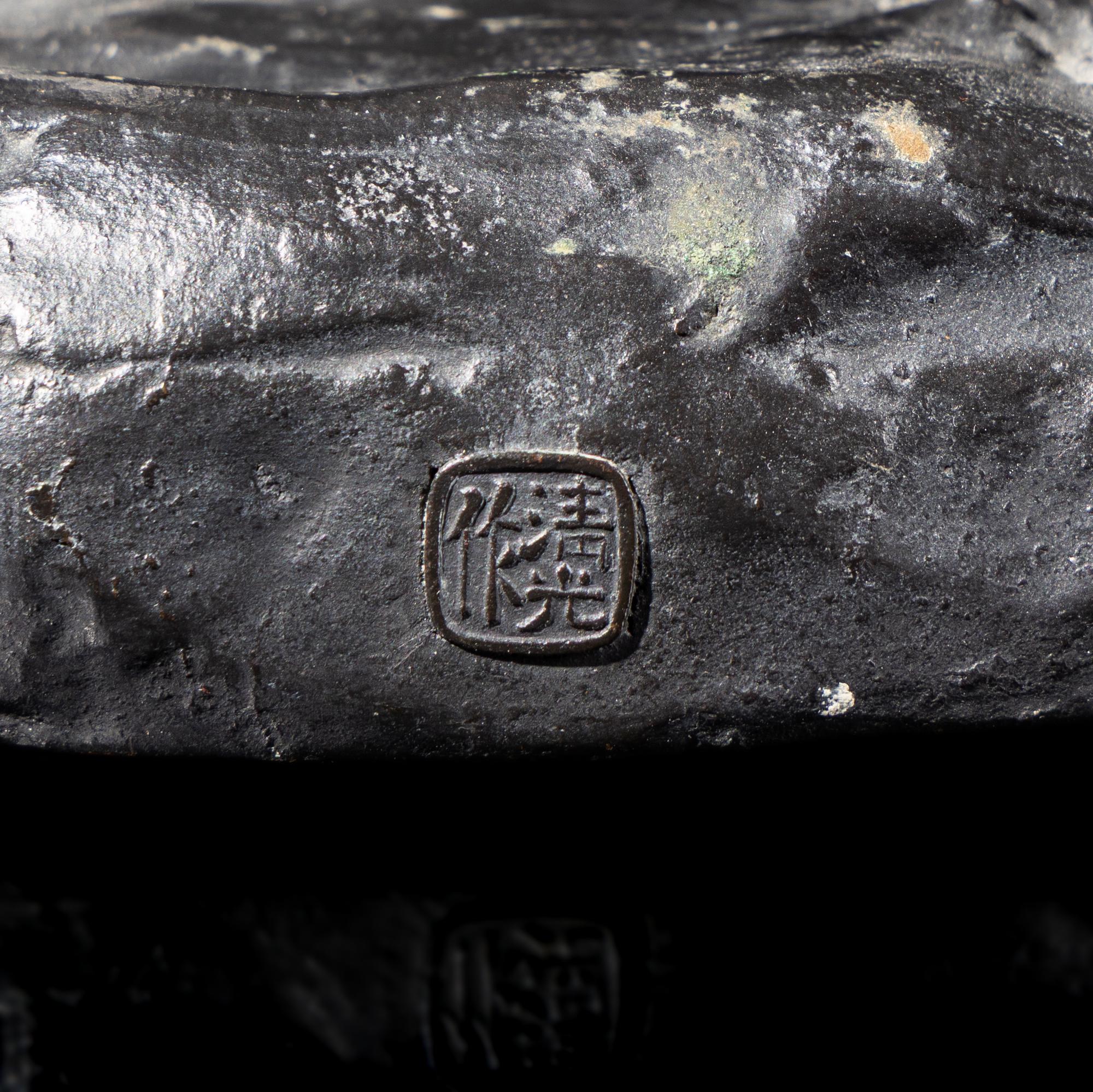 A Japanese Bronze Figure of a Fisherman by Seiko, Meiji/Taisho Period