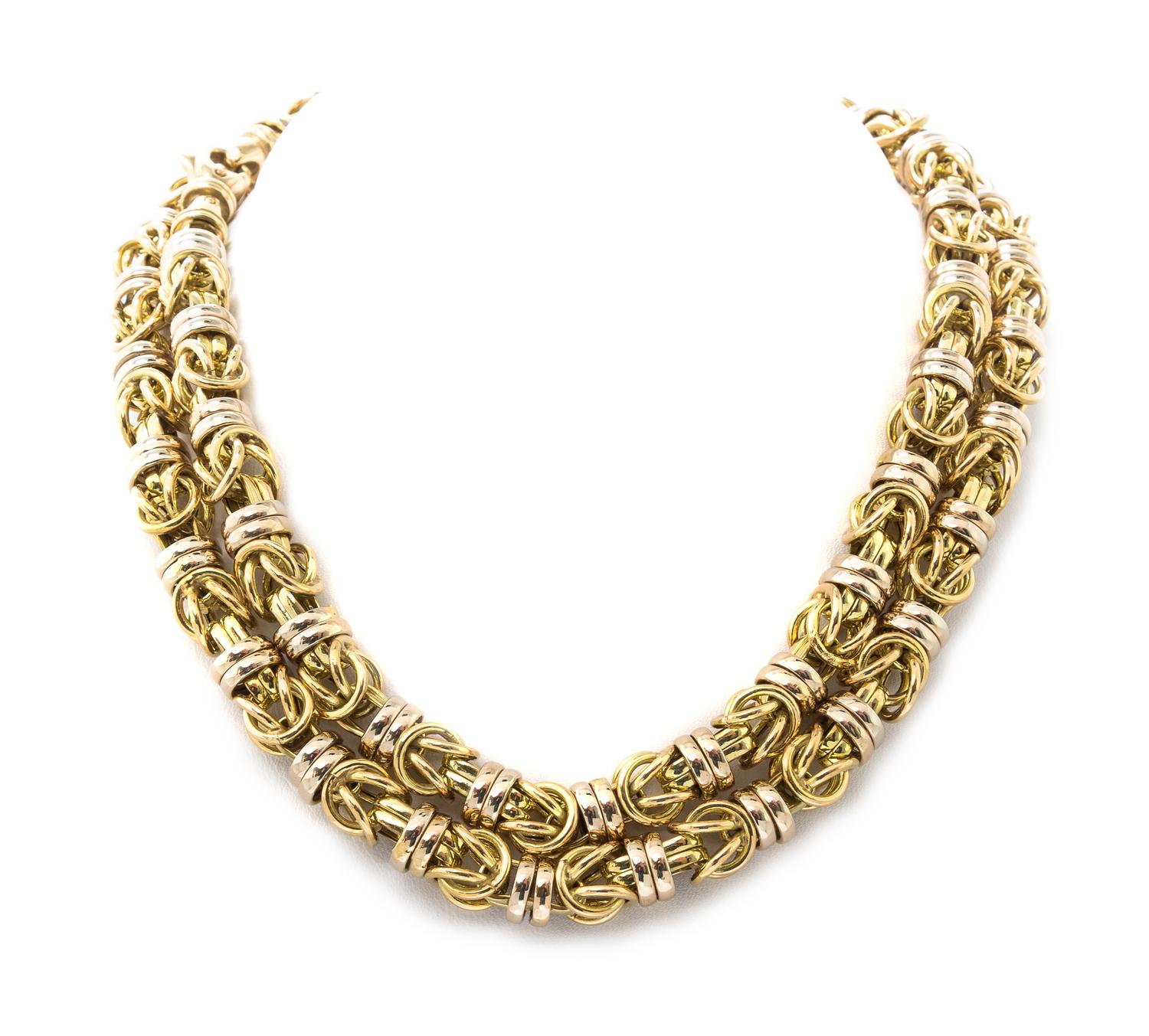 A 14 Karat Yellow and White Gold Byzantine Chain Necklace, 50.70 dwts.