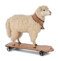A Small Leather, Wool and Glass Inset Vocal Sheep Pull Toy