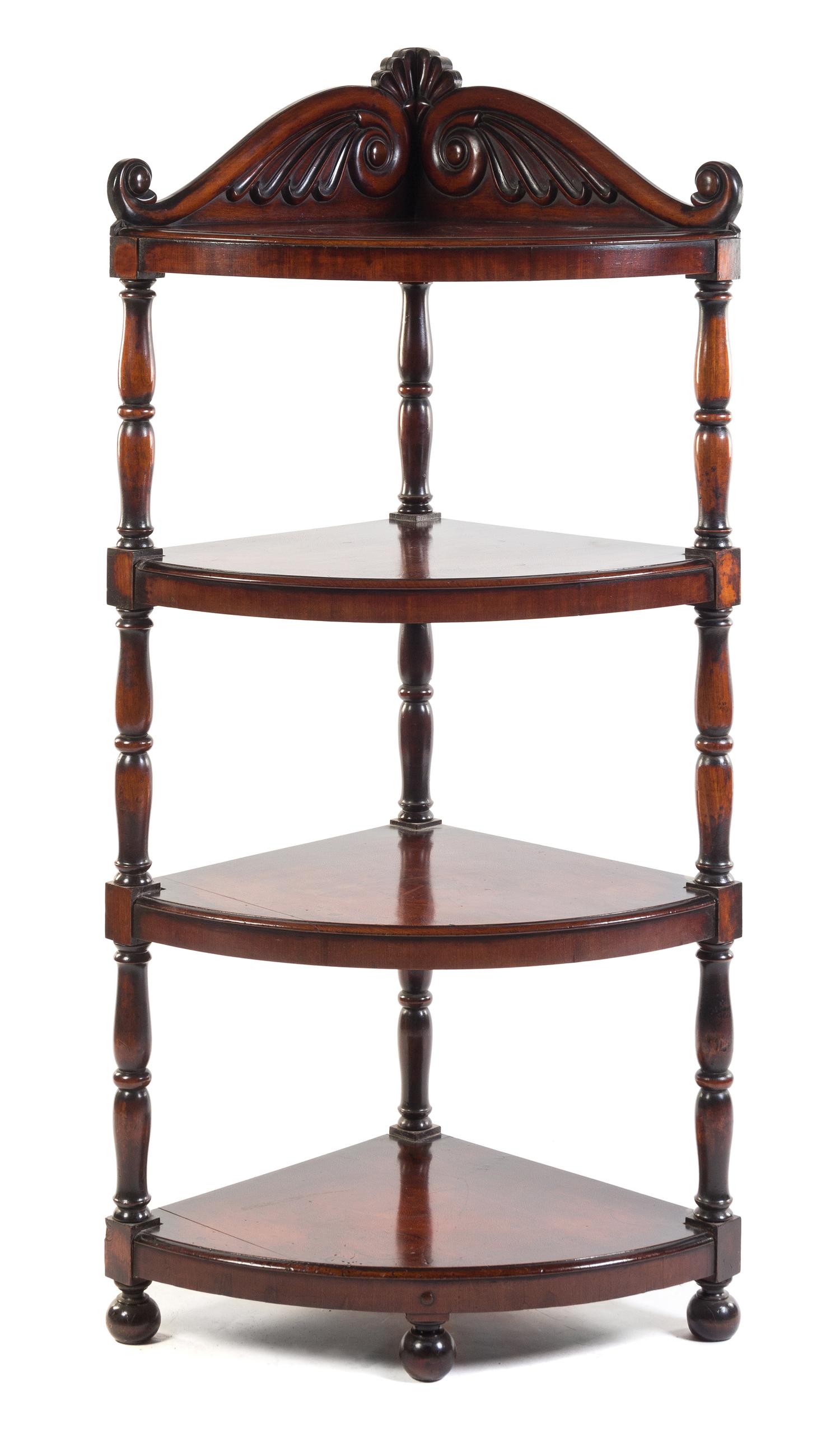 An English Mahogany Bow Front Whatnot Height 69 1/2 x width 34 x depth 24 inches.