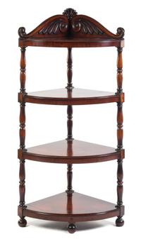 An English Mahogany Bow Front Whatnot Height 69 1/2 x width 34 x depth 24 inches.