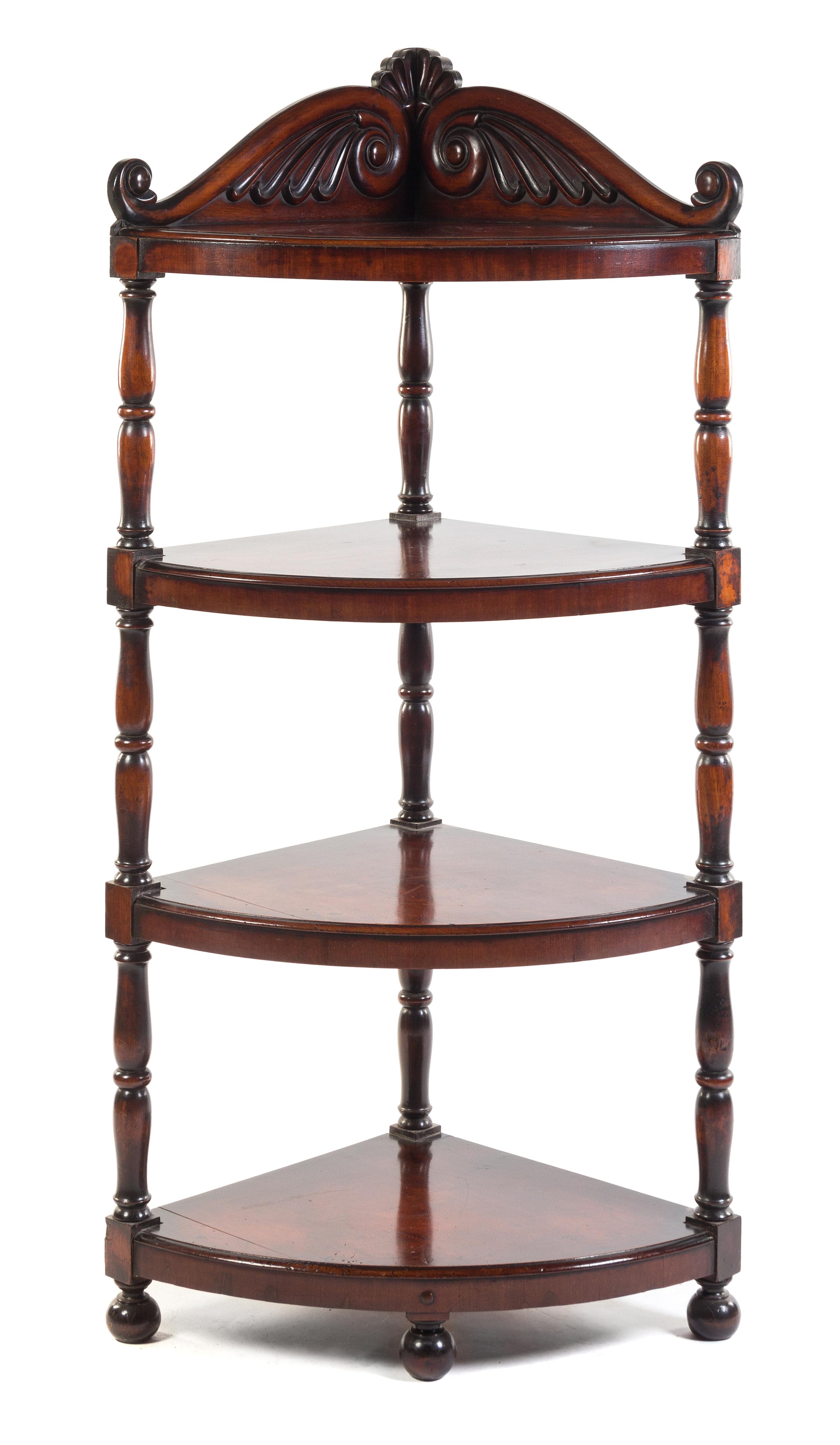 An English Mahogany Bow Front Whatnot Height 69 1/2 x width 34 x depth 24 inches.