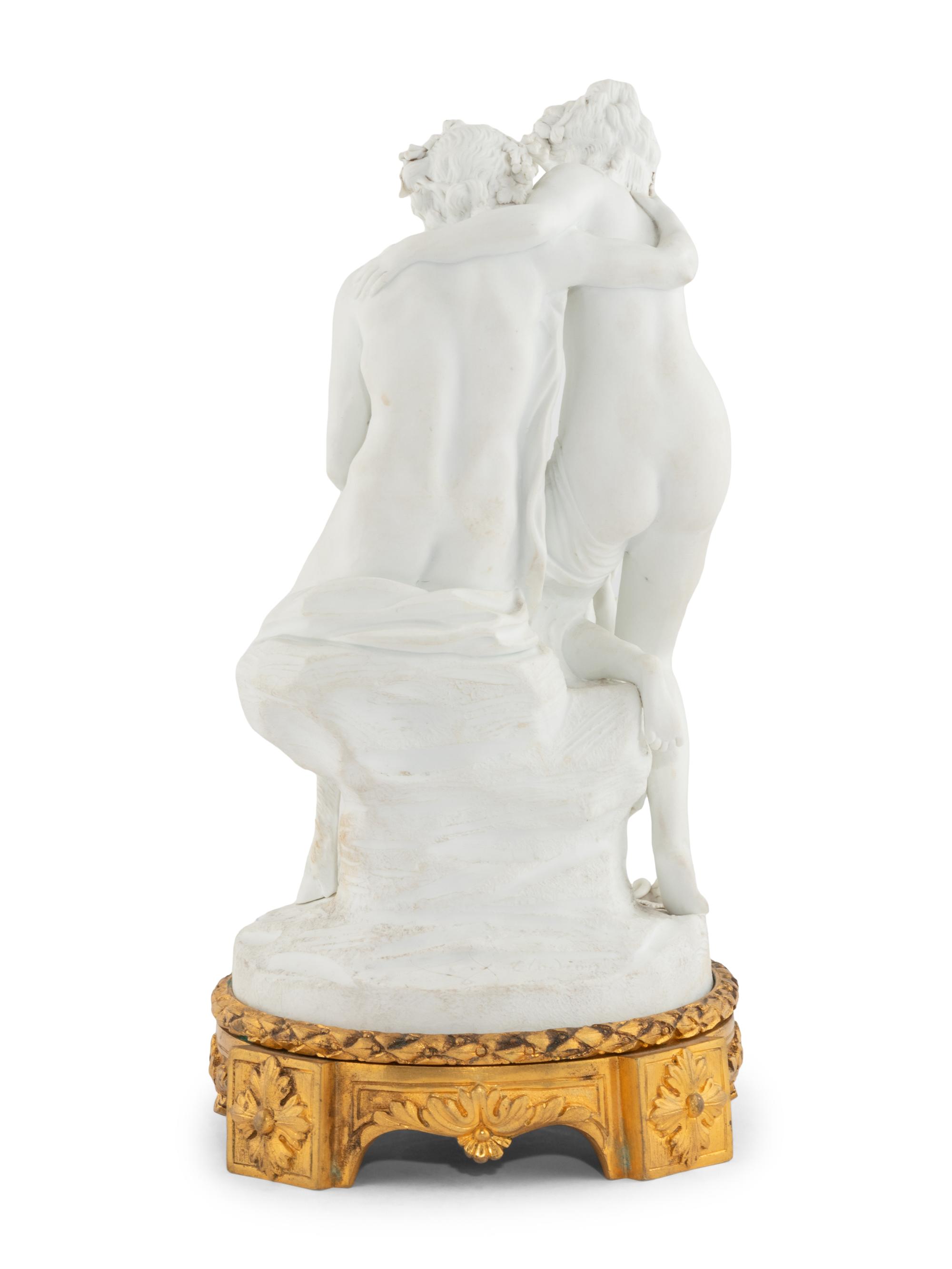 A French Gilt Bronze Mounted Biscuit Porcelain Group