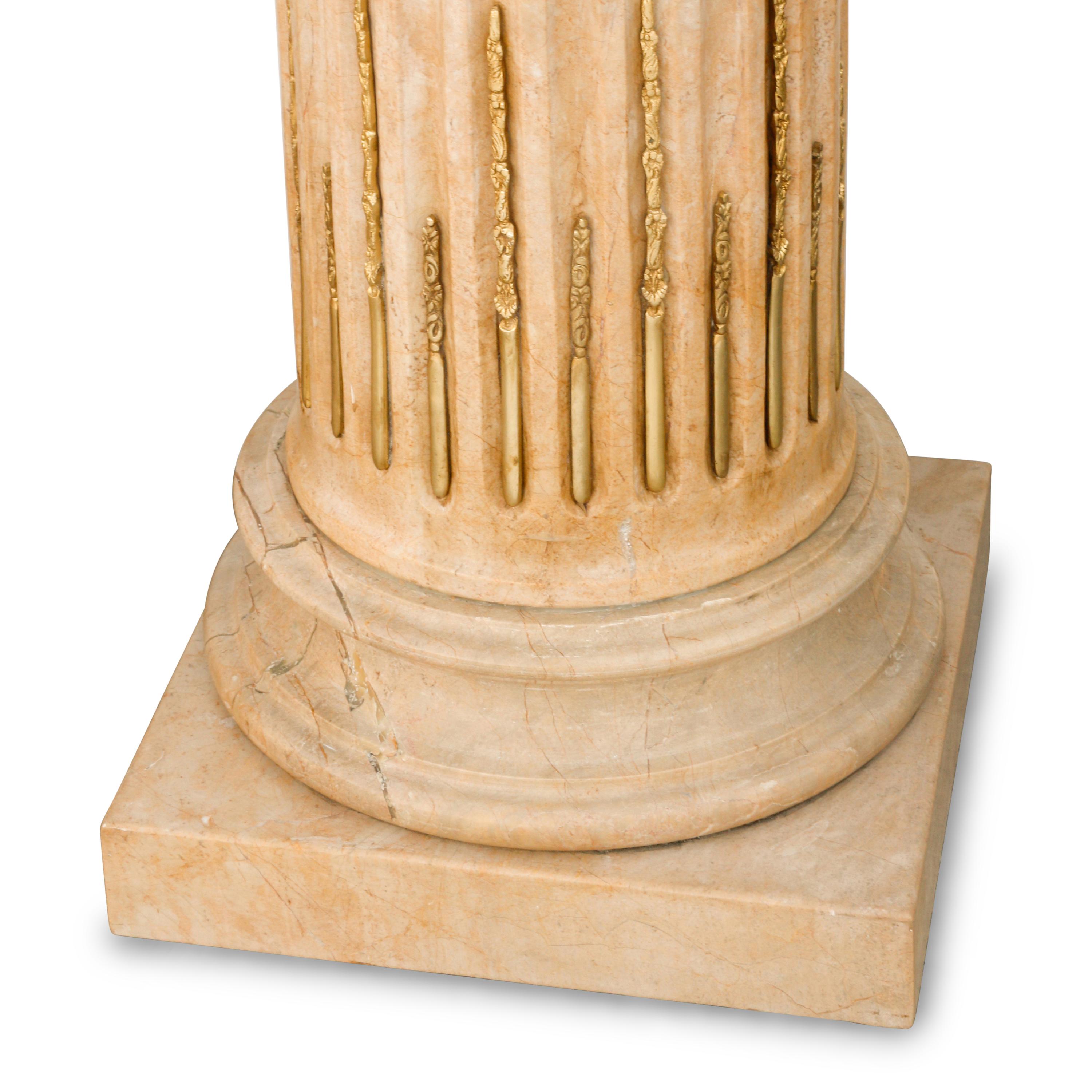 A Pair of Gilt Bronze Mounted Fluted Marble Pedestals