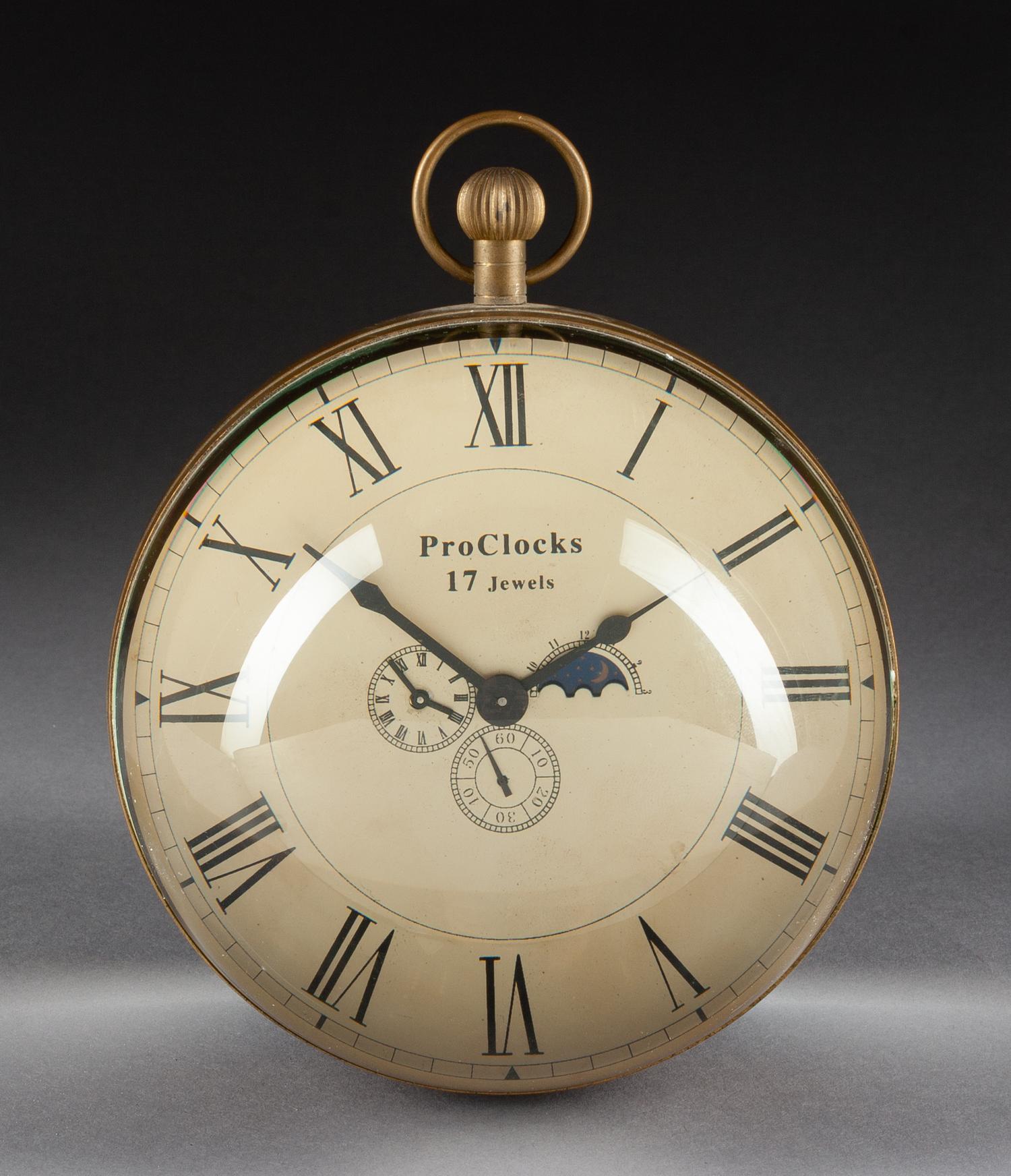 An English Bronze Mounted Rock Crystal Mantel Clock Height 6 1/2 x diameter 5 1/2 inches.
