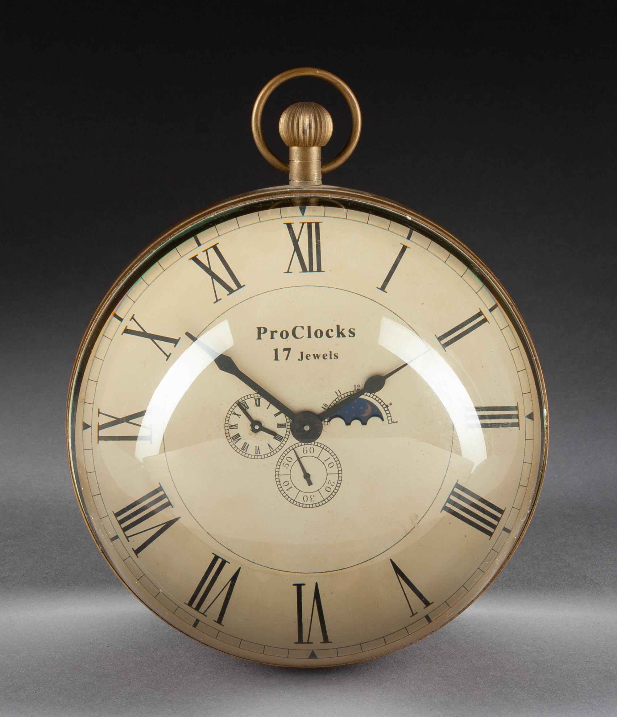 An English Bronze Mounted Rock Crystal Mantel Clock Height 6 1/2 x diameter 5 1/2 inches.