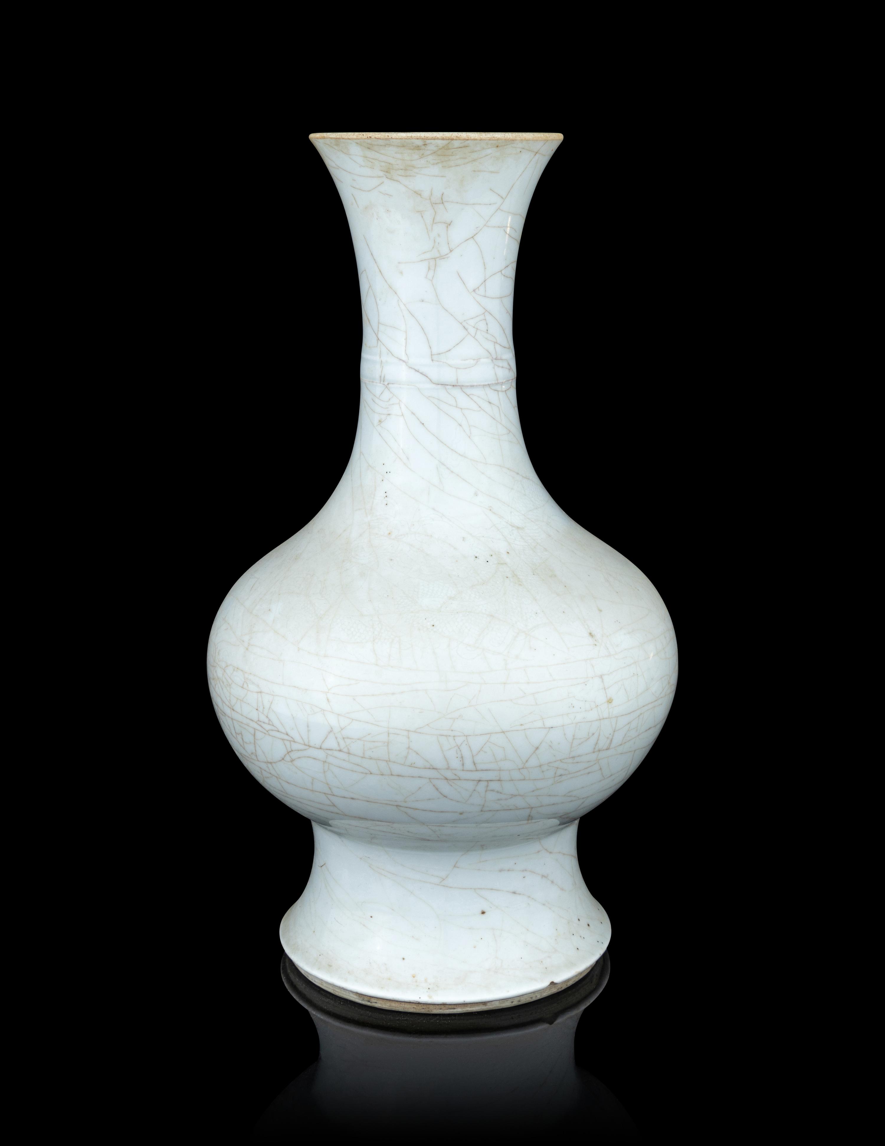 An Incised Pale Celadon Glazed Porcelain 'Dragon' Vase