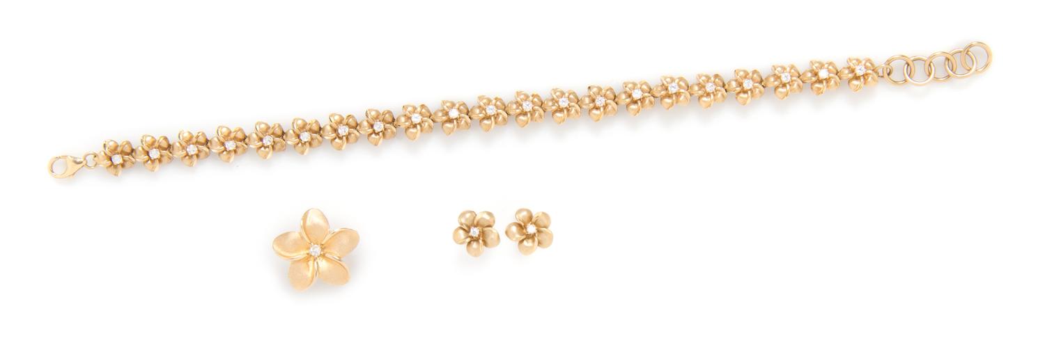 A 14 Karat Yellow Gold and Cubic Zirconia Demi Parure, 10.90 dwts.