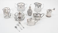 A Collection of Silver and Silver Overlay Articles, 19th and 20th Century, comprising two silver overlay creamer and sugar sets, a bamb