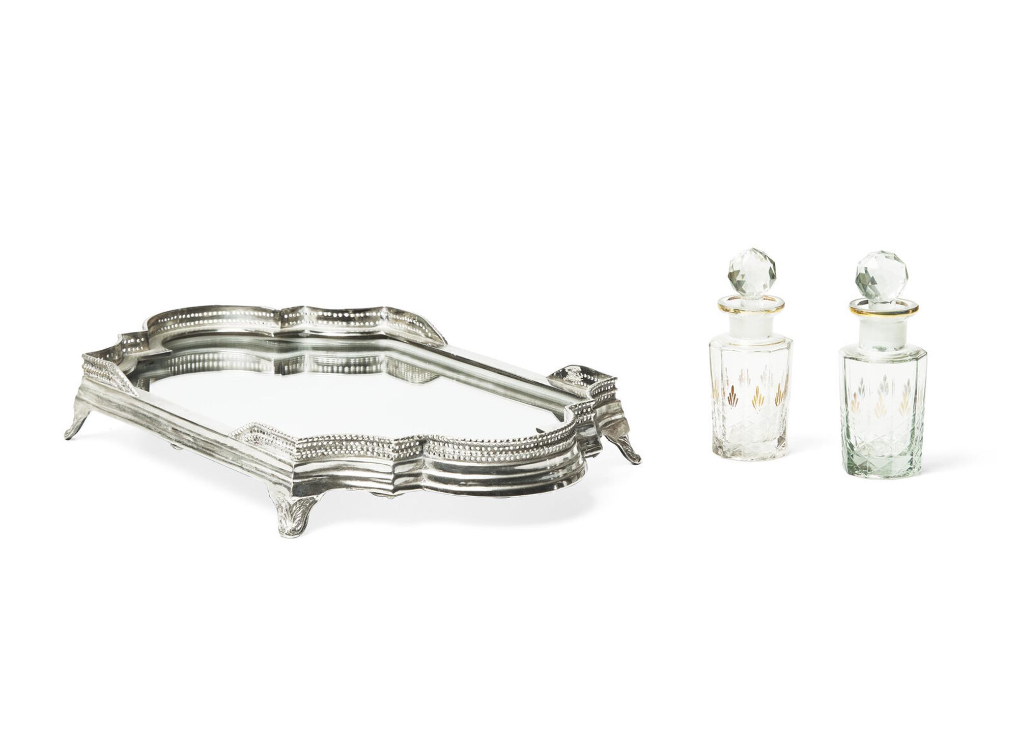A Silver-Plate and Mirrored Table Plateau and a Pair of Cut Glass Decanters