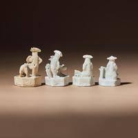 Four Miniature Chinese Blanc-de-Chine Porcelain 'European' Whistles, Late 17th-Early 18th Century — 清中期 德化白瓷西人鬥獸哨四件